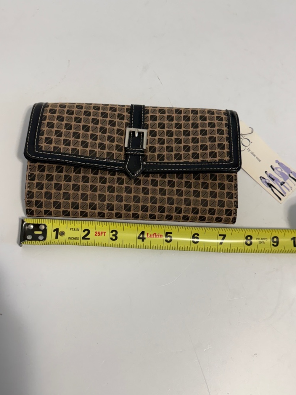 Brown Geometric Print Fold-Over Wallet with Black Trim. BY NINE WEST